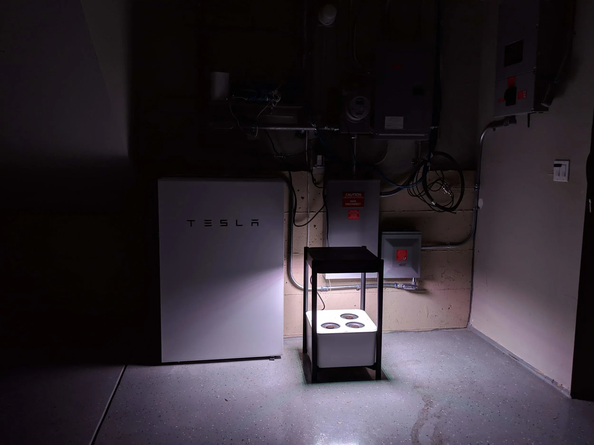 In the garage with the lights off so you can appreciate its brightness, which is a lot.