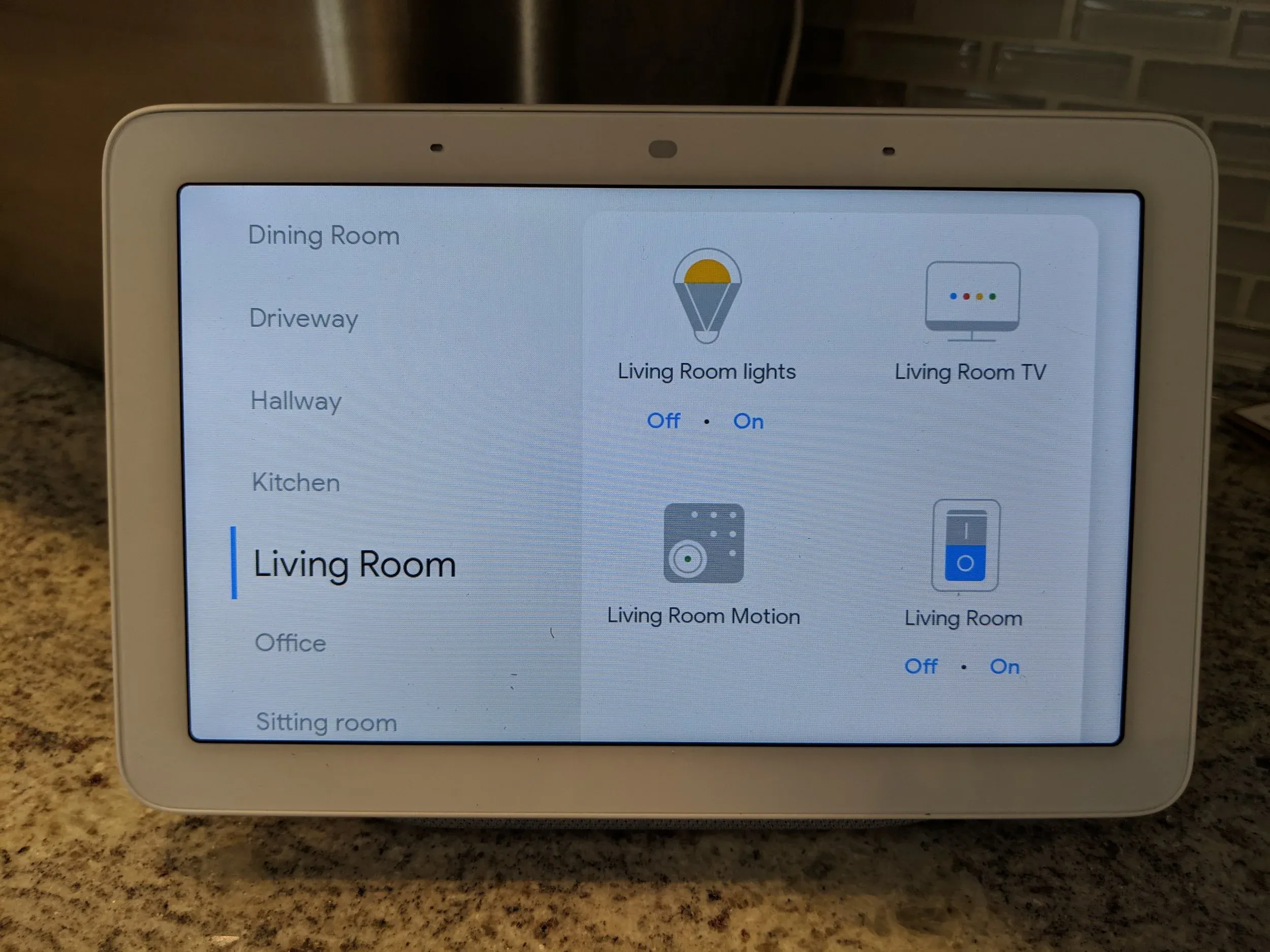 Google Home Hub showing rooms and controls